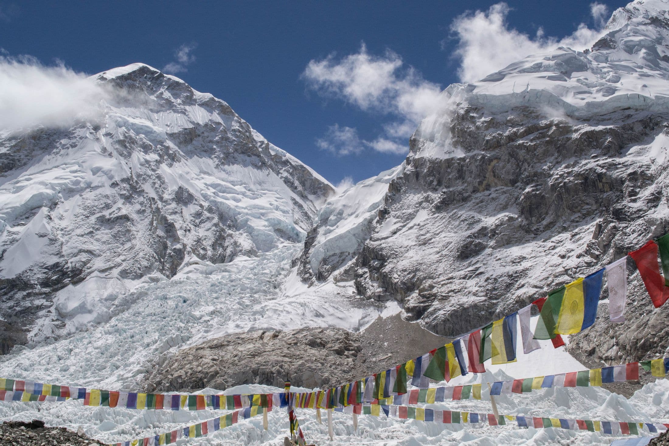Prayer flags at Everest Base Camp with the Khumbu Icefall behind